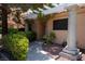 Welcoming entrance with shaded walkway, beautiful shrubbery, and decorative pillar at 2851 S Valley View Blvd # 1130, Las Vegas, NV 89102