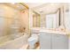 Cozy bathroom with a shower-tub combination, vanity, and mirrored medicine cabinet at 2877 Paradise Rd # 702, Las Vegas, NV 89109
