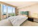 Bright bedroom with floor to ceiling windows and skyline view at 2877 Paradise Rd # 702, Las Vegas, NV 89109