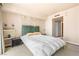Bedroom with minimalist furnishings and skyline view at 2877 Paradise Rd # 702, Las Vegas, NV 89109