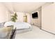 Spacious bedroom with plush carpeting and large windows, filled with natural light at 2877 Paradise Rd # 702, Las Vegas, NV 89109