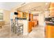 Modern kitchen with granite countertops, stainless steel appliances, and breakfast bar seating at 2877 Paradise Rd # 702, Las Vegas, NV 89109