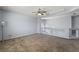 This bonus room features carpet, a ceiling fan, staircase access and an abundance of space at 3221 Epson St, Las Vegas, NV 89129