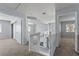 Upstairs hallway with carpet, white railings, open space, and two bedroom entrances at 3221 Epson St, Las Vegas, NV 89129