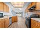 Long kitchen area leading to view of backyard at 3221 Epson St, Las Vegas, NV 89129