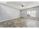 Spacious living room with tile flooring, bright lighting, and a large window providing ample natural light at 3221 Epson St, Las Vegas, NV 89129