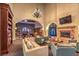 Clubhouse lounge with fireplace, billiards, library and plenty of seating at 3709 Corte Bella Hills Ave, North Las Vegas, NV 89081
