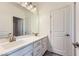 A sleek bathroom offers a double sink vanity with modern fixtures and recessed lighting at 397 Pearl Fountains Ct, Las Vegas, NV 89148