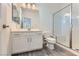 Modern bathroom featuring a walk-in shower, vanity with storage, and sleek fixtures for comfort and convenience at 397 Pearl Fountains Ct, Las Vegas, NV 89148