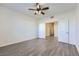 Spacious bedroom featuring tile floors, neutral walls, and direct access to adjacent rooms at 397 Pearl Fountains Ct, Las Vegas, NV 89148