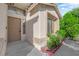 Inviting home entrance featuring a stylish front door and charming landscaping at 412 Carlton Kay Pl, Las Vegas, NV 89144