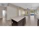 Open kitchen featuring a center island, neutral countertops, and views to the living room at 412 Carlton Kay Pl, Las Vegas, NV 89144