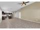 Living room view showcases tile floors with kitchen and entryway access at 412 Carlton Kay Pl, Las Vegas, NV 89144