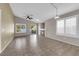 Spacious living room with tile floors, fireplace, and slider to the back at 412 Carlton Kay Pl, Las Vegas, NV 89144