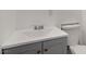 Close-up of remodeled bathroom, with updated vanity, hardware, and toilet at 4829 Hot Springs Ave, Las Vegas, NV 89110