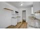 Well-lit kitchen featuring white cabinets, granite countertops, and stainless steel appliances at 4829 Hot Springs Ave, Las Vegas, NV 89110