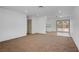 Open-concept living room with a seamless flow to the kitchen and gleaming hardwood floors at 4829 Hot Springs Ave, Las Vegas, NV 89110