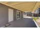 Backyard with covered patio, accessible via sliding glass door or exterior door at 4829 Hot Springs Ave, Las Vegas, NV 89110