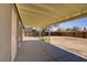 Spacious covered patio transitions to a large backyard, perfect for outdoor entertaining at 4829 Hot Springs Ave, Las Vegas, NV 89110