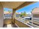 Balcony view of the surrounding neighborhood and ample parking, providing outdoor space at 5052 S Rainbow Blvd # 201, Las Vegas, NV 89118