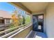 Relaxing balcony with views of neighborhood greenery, perfect for enjoying fresh air at 5052 S Rainbow Blvd # 201, Las Vegas, NV 89118