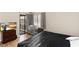 Bright bedroom with wood floors, balcony, and crib, offering space and natural light at 5052 S Rainbow Blvd # 201, Las Vegas, NV 89118