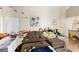 Comfortable living room with wood-look floors and an open layout that flows into the kitchen at 5052 S Rainbow Blvd # 201, Las Vegas, NV 89118