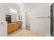 This bathroom features dual sinks, a walk-in shower, and extra cabinet space at 517 Chance Cove Dr, Henderson, NV 89052