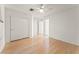 Bedroom with hardwood floors, closet with sliding doors, and neutral walls at 517 Chance Cove Dr, Henderson, NV 89052