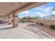 Relax on the covered patio beside the pool and enjoy backyard views at 517 Chance Cove Dr, Henderson, NV 89052