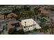Aerial view of a single-story home with desert landscaping, pool and manicured backyard at 6100 Cocktail Dr, Las Vegas, NV 89130