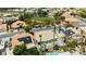 Birds eye view of a single-story home with a pool and desert landscaping at 6100 Cocktail Dr, Las Vegas, NV 89130