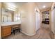 Vanity and dressing area connected to the main bath and bedroom at 6209 Exquisite Ave, Las Vegas, NV 89110