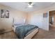 Stylish bedroom with contemporary decor and modern ceiling fan at 6209 Exquisite Ave, Las Vegas, NV 89110