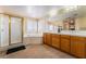 Expansive bathroom with dual sinks, soaking tub, and a glass-enclosed shower at 6209 Exquisite Ave, Las Vegas, NV 89110