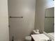 Neutral toned bathroom featuring a single sink and modern fixtures at 6462 Saddle Up Ave # 103, Henderson, NV 89011