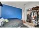Cozy bedroom features a closet with accessible storage and a queen size bed at 671 Riata Way, Las Vegas, NV 89110