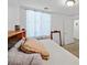 Bedroom featuring bright natural light, a built-in headboard, and closet at 6868 Sky Pointe Dr # 1107, Las Vegas, NV 89131