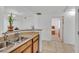 Updated kitchen seamlessly connects to living area, offering both style and functionality at 6868 Sky Pointe Dr # 1107, Las Vegas, NV 89131