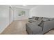 Cozy living room featuring comfortable seating and ample natural light at 6868 Sky Pointe Dr # 1107, Las Vegas, NV 89131