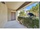 Relaxing covered outdoor patio space with privacy plants, perfect for enjoying the fresh air at 6868 Sky Pointe Dr # 1107, Las Vegas, NV 89131