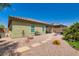 Backyard featuring a gravel area with fire pit seating, providing a cozy outdoor retreat at 7224 Piute Mesa St, North Las Vegas, NV 89084