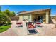 Backyard featuring a gravel area with fire pit seating, providing a cozy outdoor retreat at 7224 Piute Mesa St, North Las Vegas, NV 89084