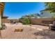 Gravel backyard featuring a fire pit, gravel area, and comfortable outdoor seating, perfect for relaxation at 7224 Piute Mesa St, North Las Vegas, NV 89084
