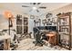 Cozy bedroom featuring an ample collection of sports-themed memorabilia displayed neatly on shelves and walls at 7224 Piute Mesa St, North Las Vegas, NV 89084