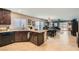 Open kitchen featuring granite countertops and stainless steel appliances with adjoining living spaces at 7224 Piute Mesa St, North Las Vegas, NV 89084