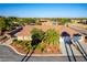 Expansive aerial view of a lovely home boasting a well-maintained yard and convenient three-car garage at 8650 W Verde Way, Las Vegas, NV 89149