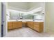 Large bathroom with double sinks, vanity mirror, and tile floors at 8650 W Verde Way, Las Vegas, NV 89149