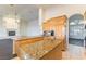 Gourmet kitchen with granite countertops, maple cabinets, and stainless steel appliances at 8650 W Verde Way, Las Vegas, NV 89149