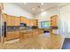 Spacious kitchen with custom cabinets, granite countertops, and stainless steel appliances at 8650 W Verde Way, Las Vegas, NV 89149